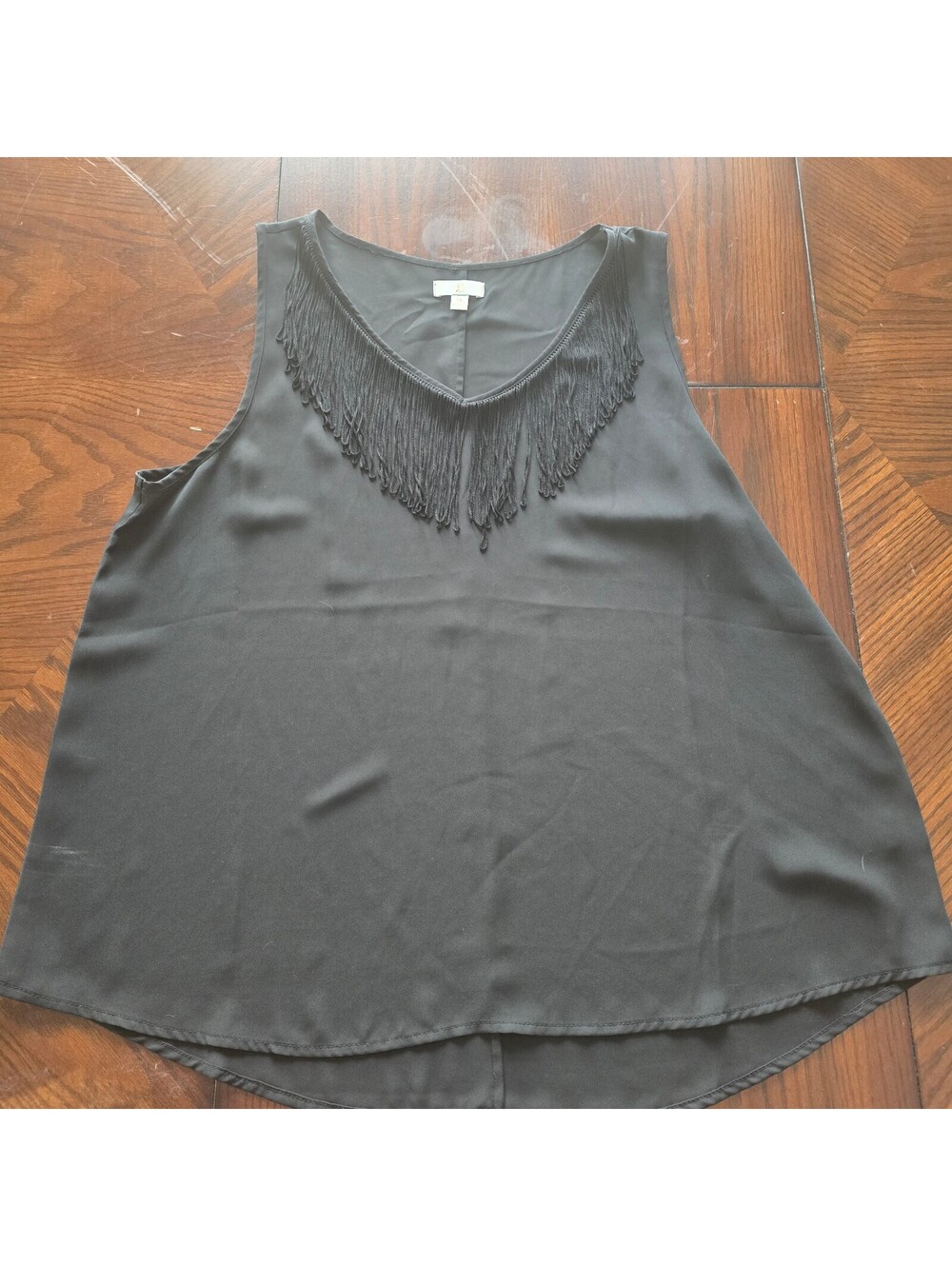 Black fringe sleeveless blouse